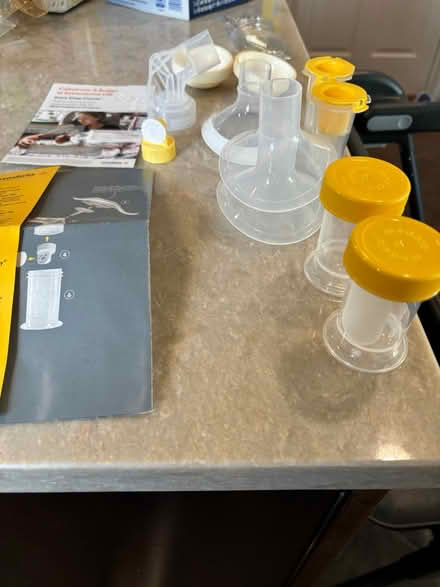 Photo of free Medela pump parts and containers (Evanston (Green Bay & Emerson)) #2