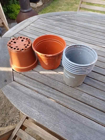 Photo of free 7 plastic flower pots (Woodley RG5) #1