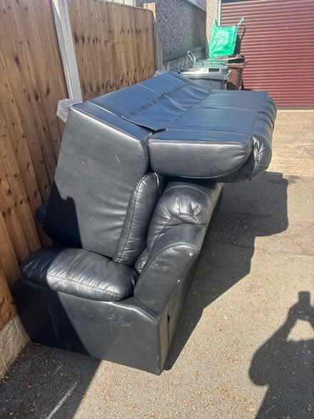 Photo of free 2 black sofas (Abergele) #2