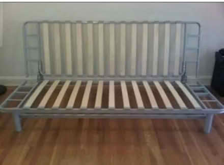 Photo of free NYHAMN 3-seat sofa-bed frame (Horley RH6) #1
