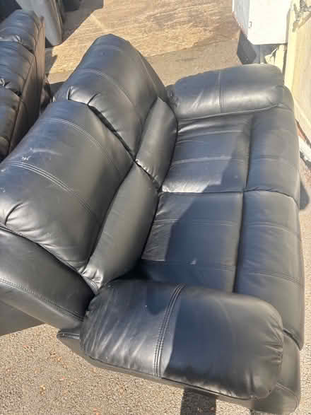 Photo of free 2 black sofas (Abergele) #1