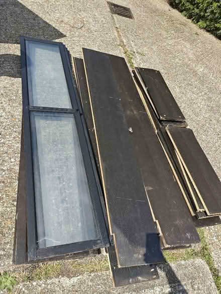 Photo of free 2x black IKEA shelves with glass doors (Horsell GU21) #1