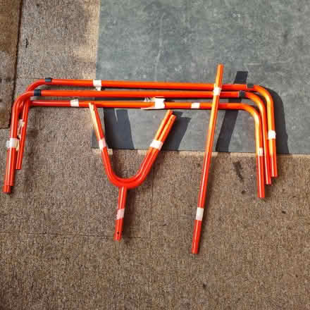 Photo of free Red metal clothes rack- missing piece (The Camp AL4) #1