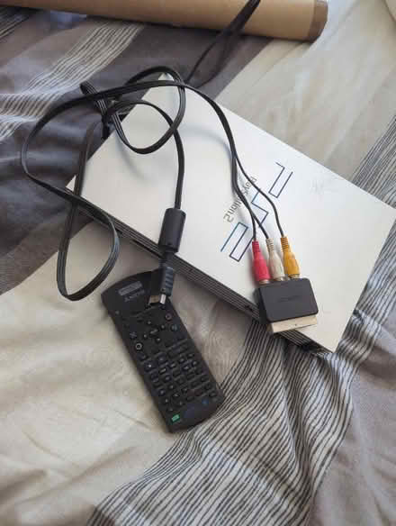 Photo of free Silver PS2 and remote (Temple Rhydding BD17) #1