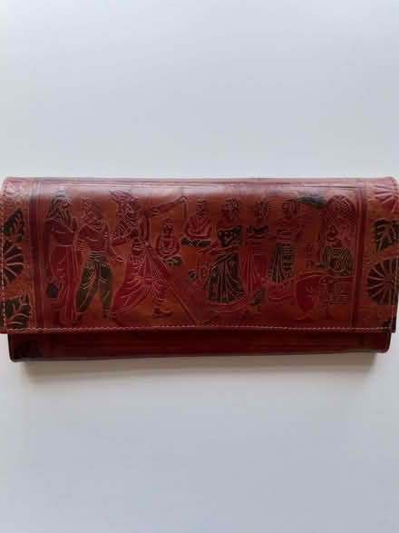 Photo of free Decorated brown leather clutch (Wandsworth Common SW12) #1