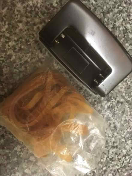 Photo of free 2 hole punch and bag of elastic bands (Queens Park CM12) #1