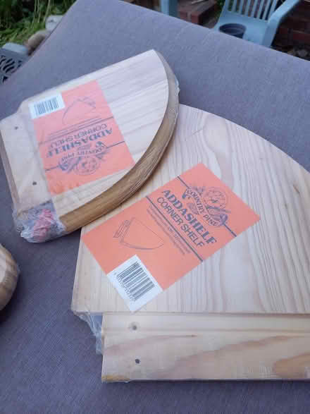 Photo of free two corner wooden shelves (hainault, essex. IG6) #1