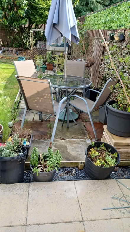 Photo of free Patio table ,umbrella and chairs ..base not included (Upton CH49) #1