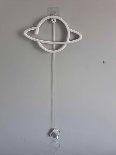 Photo of free Neon Saturn Sign (Heswall) #2