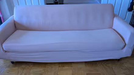 Photo of free Brown couch (with pink couch cover) (Rosslyn/Arlington, VA) #2