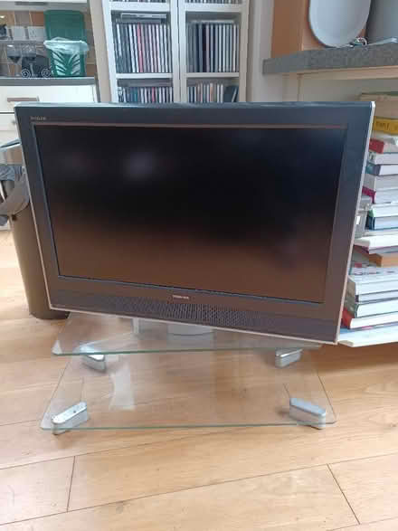 Photo of free Toshiba 32" LCD TV and glass TV stand ideally togethef (Canton CF11) #1