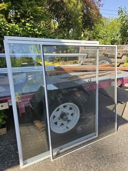 Photo of free Andersen storm door glass & screen (SeaTac) #1