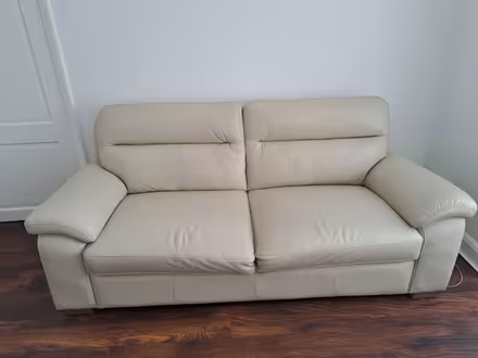 Photo of free Two cream leather sofas (Leatherhead) #2