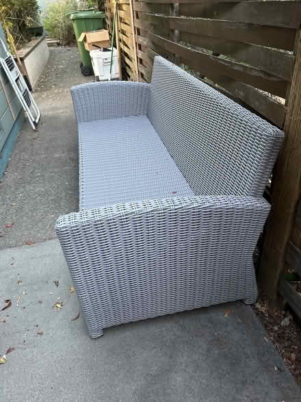 Photo of free Outdoor rattan couch (Bret Harte area of San Rafael) #1