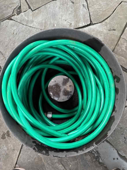 Photo of free Metal water hose holder & hose (Tucker, Georgia) #2