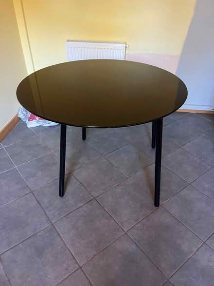 Photo of free Black Ikea table. Tubular metal frame, tempered glass top. (Druids Heath B14) #3