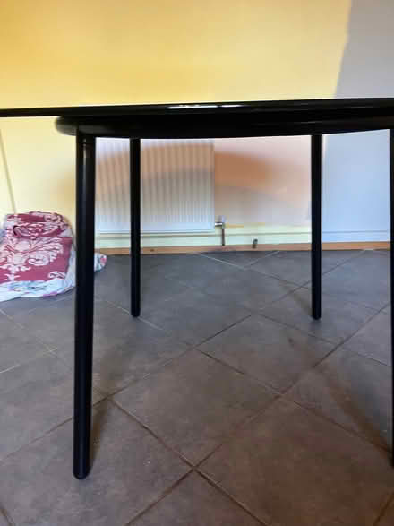 Photo of free Black Ikea table. Tubular metal frame, tempered glass top. (Druids Heath B14) #2