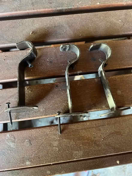Photo of free Rod hanger with screws (Berkeley) #1