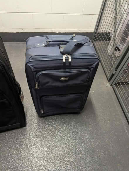 Photo of free 2 large size rolling suitcases (Toronto) #4