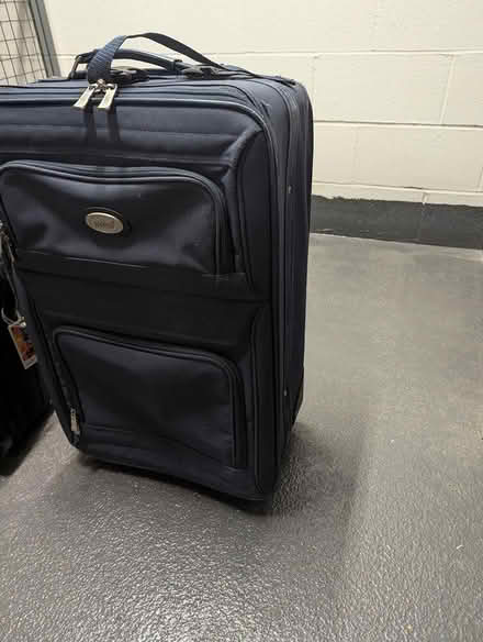 Photo of free 2 large size rolling suitcases (Toronto) #1