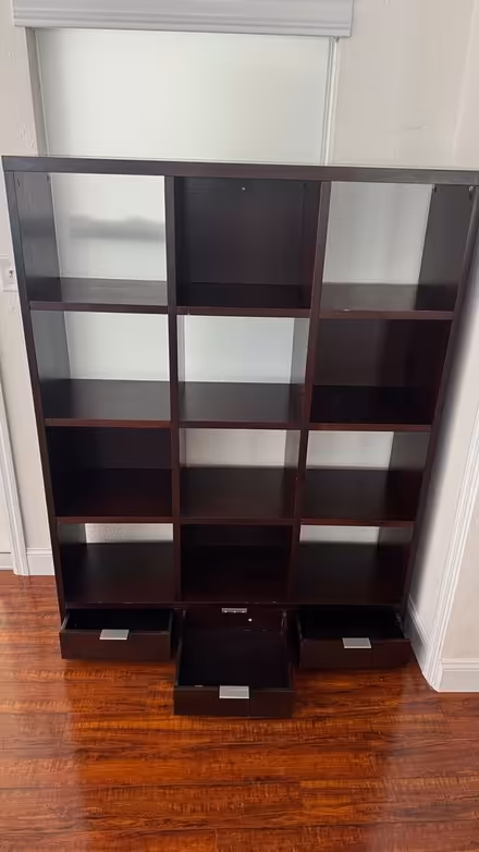 Photo of free Tall wooden bookshelf open boxes (4th Street & 38th Ave) #1