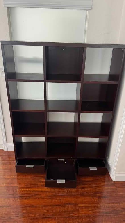 Photo of free Tall wooden bookshelf open boxes (4th Street & 38th Ave) #1