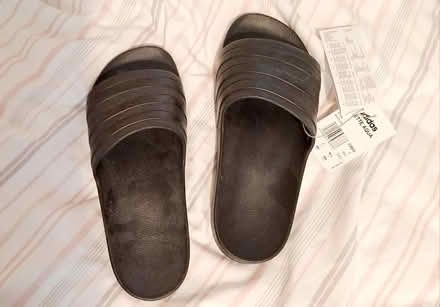 Photo of free Adidas sliders 7 new (Bramley, Hants RG26) #2