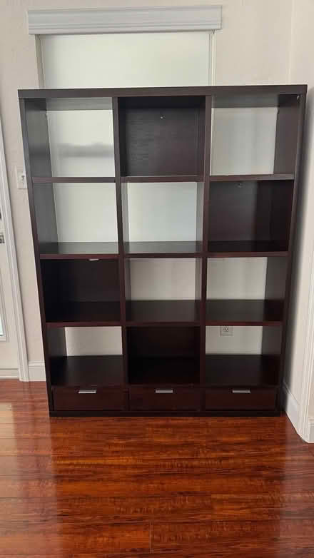 Photo of free Tall wooden bookshelf open boxes (4th Street & 38th Ave) #3