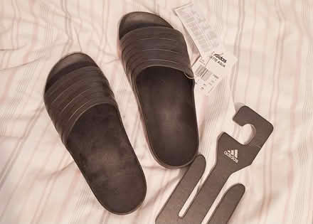 Photo of free Adidas sliders 7 new (Bramley, Hants RG26) #1