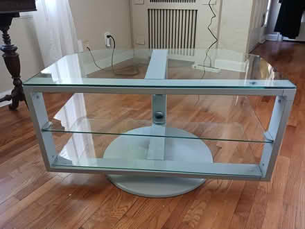Photo of free Swivel Glass TV Stand/Storage Unit (Wildwood (East Olympia)) #1