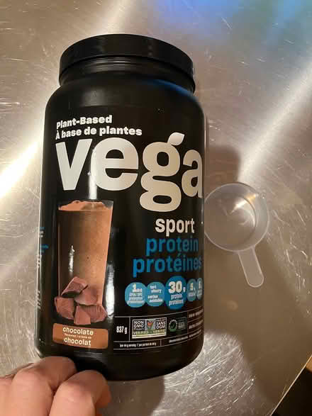 Photo of free Empty protein powder tub with scoop (Crystal Beach) #1