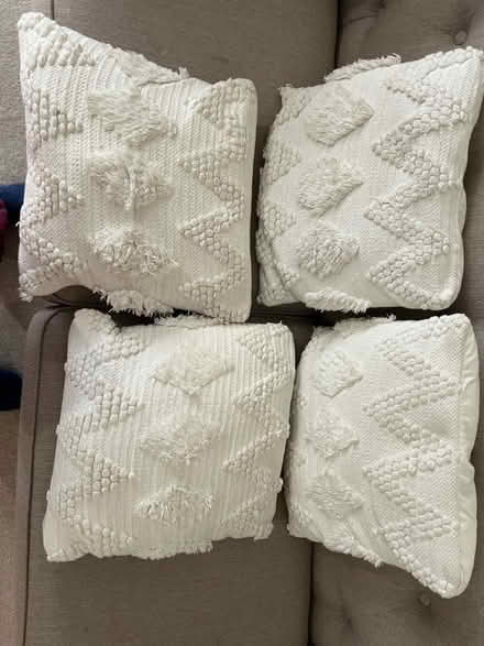 Photo of free Cushions x 4 white x 3 pink (CR3 Caterham on the hill) #1