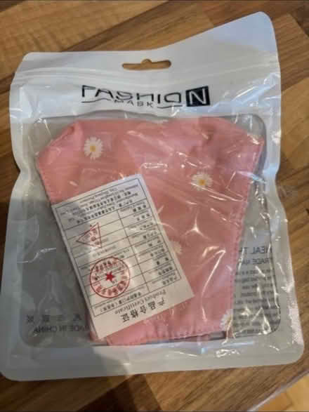 Photo of free New pink daisy face mask (Woking GU21) #1