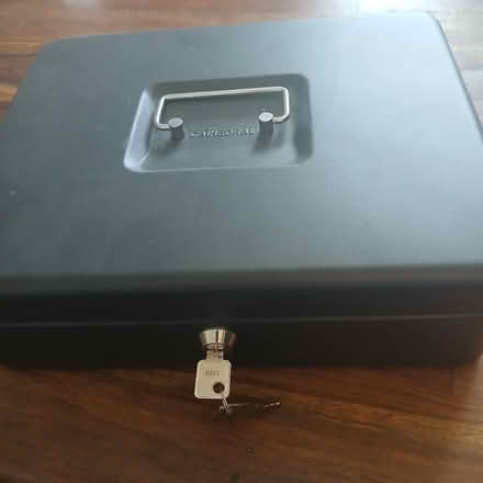 Photo of free Large heavy money tin (Spixworth NR10) #1