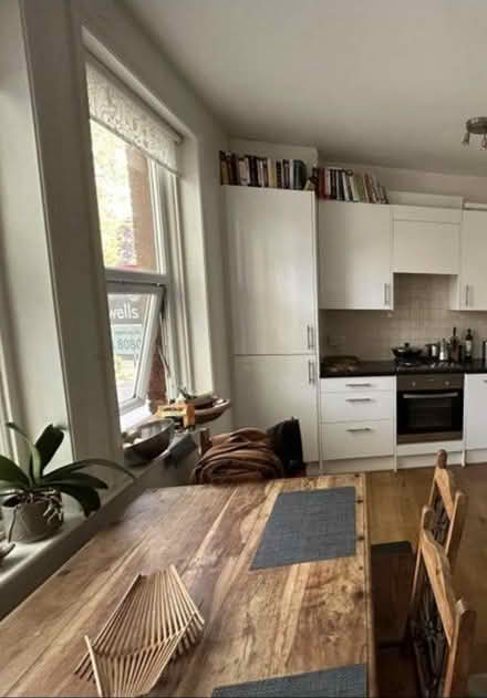 Photo of free Dining table with 4 chairs (N8 7LA) #1