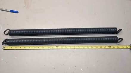 Photo of free 2 garage door extension springs (Maple Leaf) #1