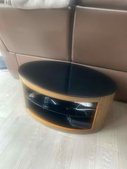 Photo of free Glass/wood tv stand/coffee table (Banstead SM7) #1