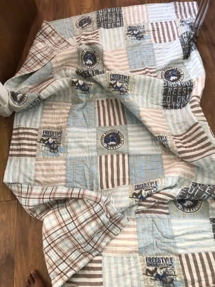 Photo of free Single bed quilt /throw - snowboarding (Richmond TW1) #3