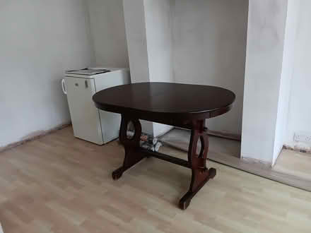 Photo of free Large extending dining room table (Broughton Astley LE9) #1
