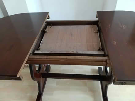 Photo of free Large extending dining room table (Broughton Astley LE9) #2