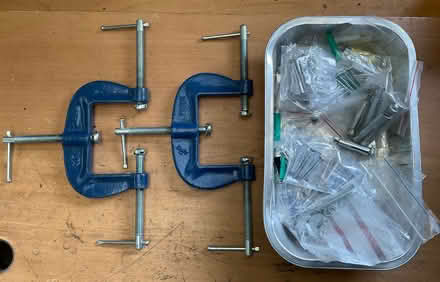 Photo of free Two edge clamps and small tray of screws/plugs etc (Beaconsfield HP9) #1