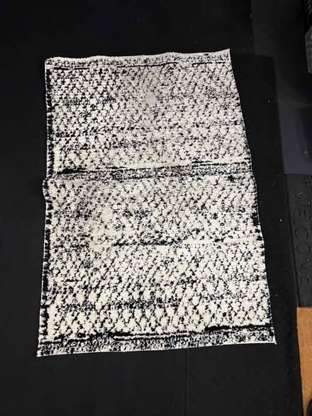 Photo of free Black and white rug (Amityville) #1