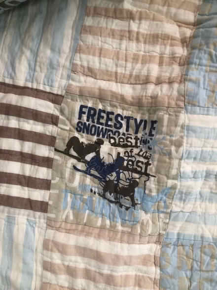 Photo of free Single bed quilt /throw - snowboarding (Richmond TW1) #1