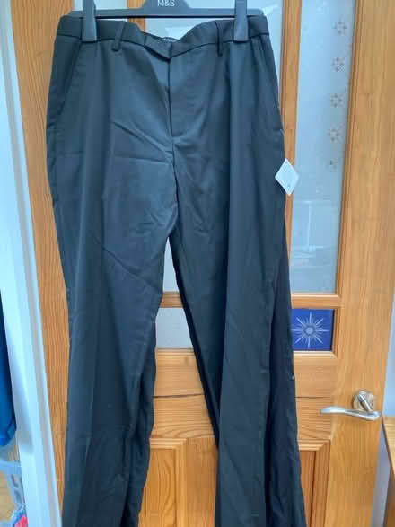 Photo of free 2 pairs new black school trousers (Victoria Park CF5) #1
