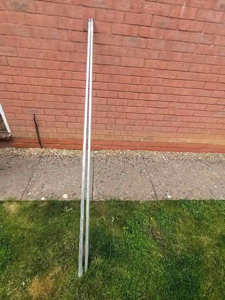 Photo of free New 6 foot chrome poles (Melksham) #4