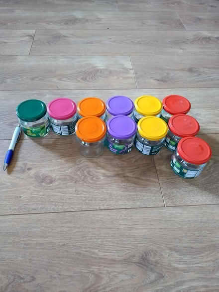 Photo of free Small glass jars, rainbow lids (Riseley, Bedford) #3