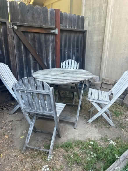 Photo of free Outdoor folding wood table/4 chairs (South Davis) #3