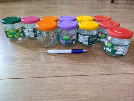 Photo of free Small glass jars, rainbow lids (Riseley, Bedford) #1