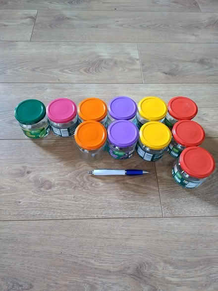 Photo of free Small glass jars, rainbow lids (Riseley, Bedford) #2