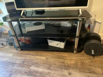Photo of free Glass TV stand (New Town CO2) #1